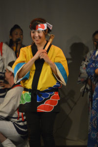 Our beloved member, Mari Ford, participating in the Nanbu Mochitsuki dance at our 2017 student concerts. Photograph by John Kovacs